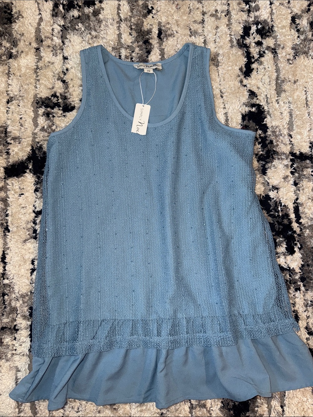 Simply Noelle Light Blue Sleeveless Knit Ruffle Hem Top